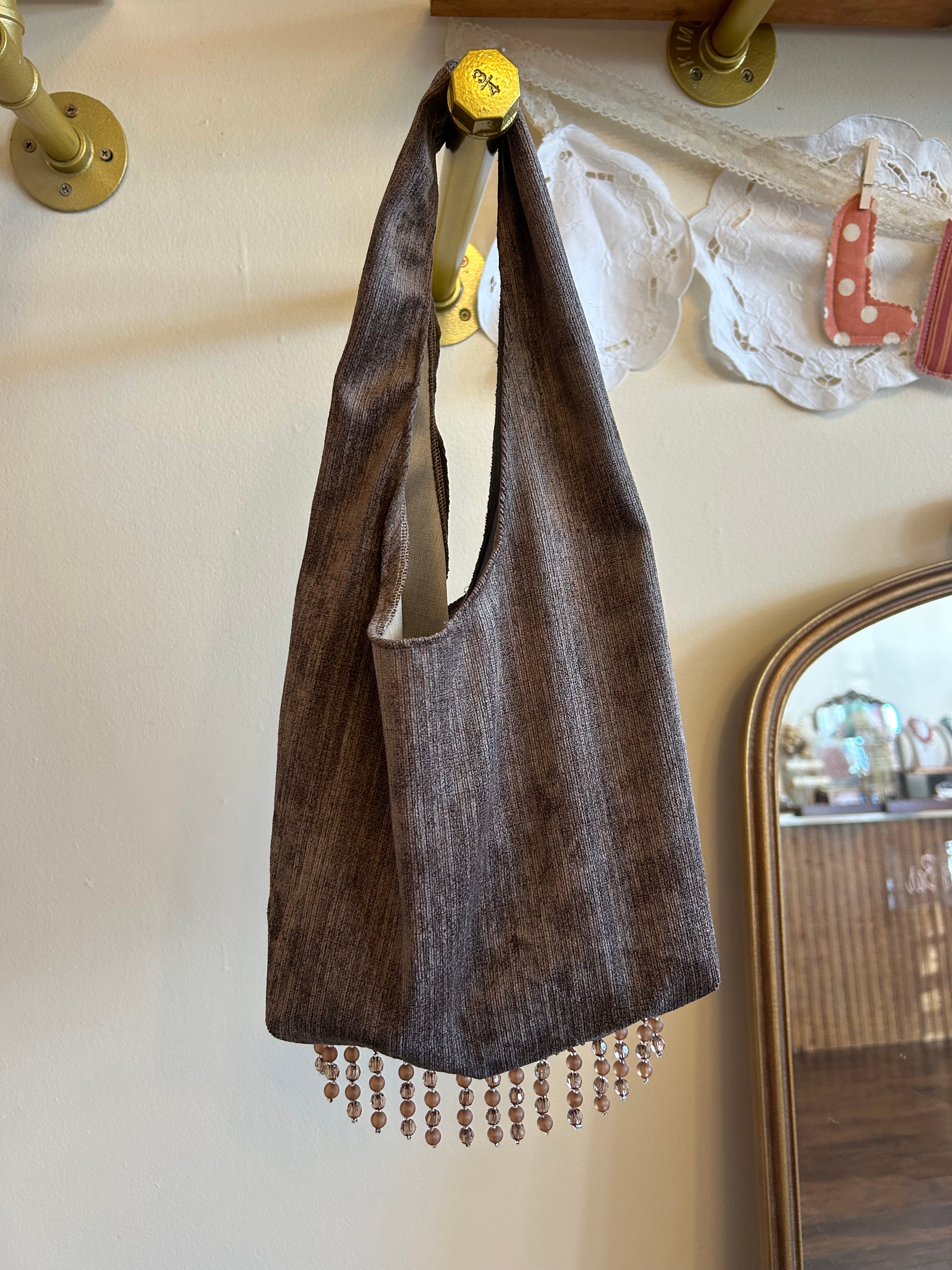 Brown faux suede purse with crystal trim