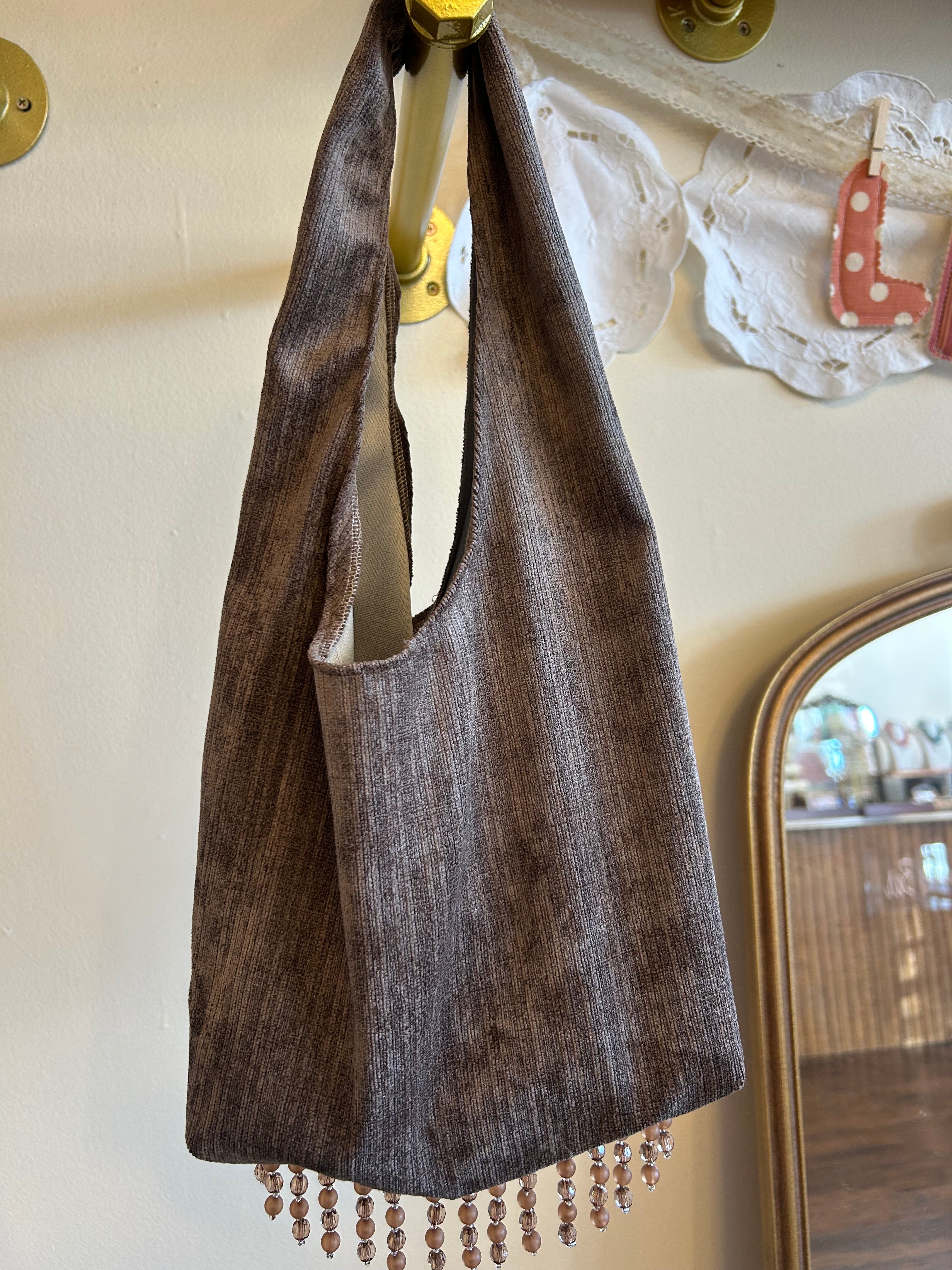 Brown faux suede purse with crystal trim