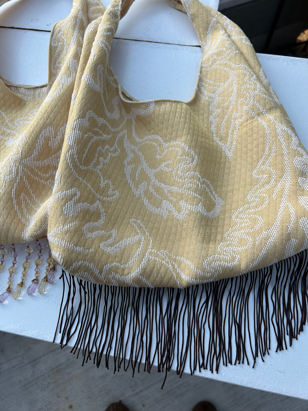 Yellow Tassel purse with brown fringe trim
