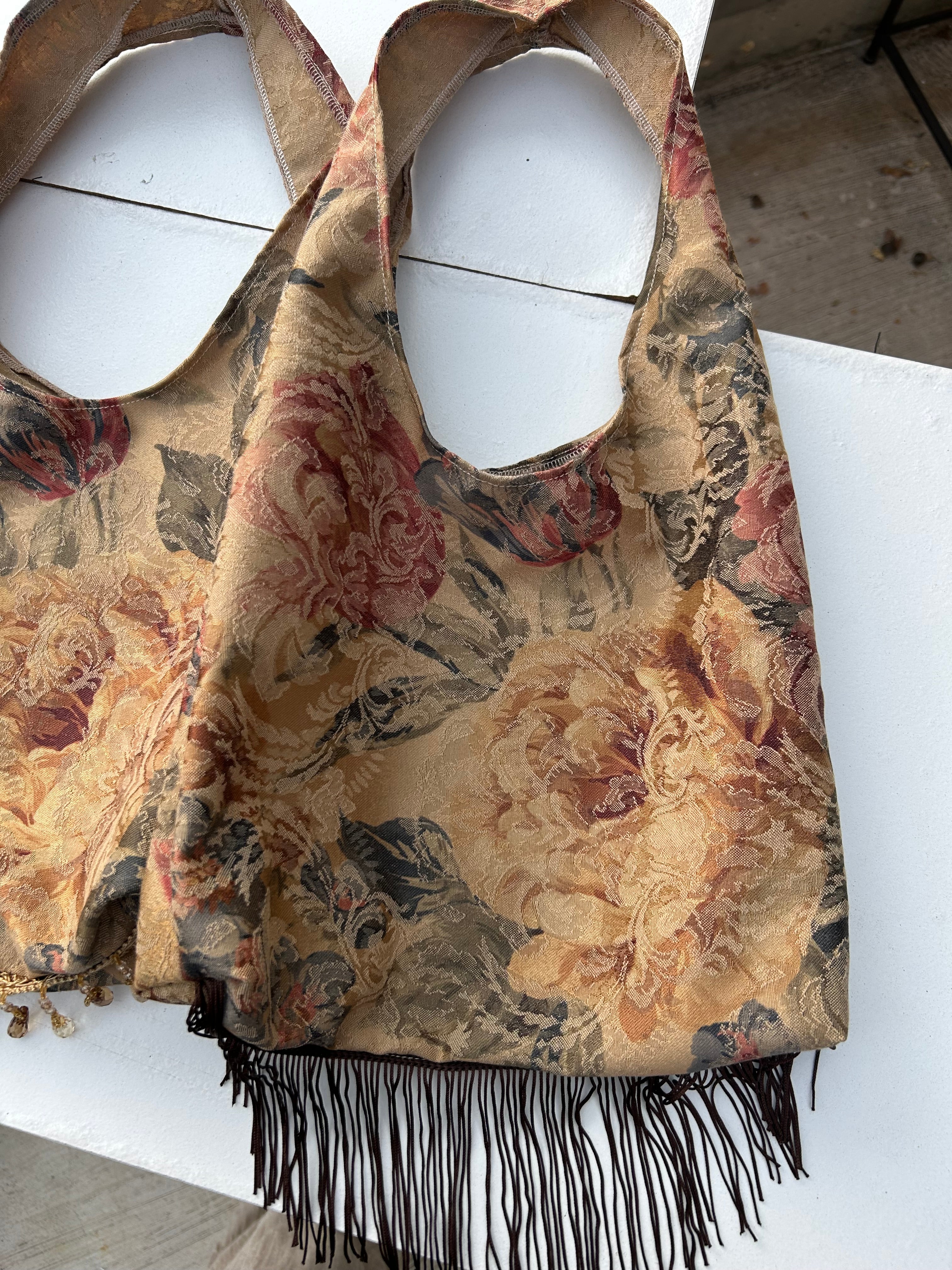 Brown floral tassel purse with brown fringe trim