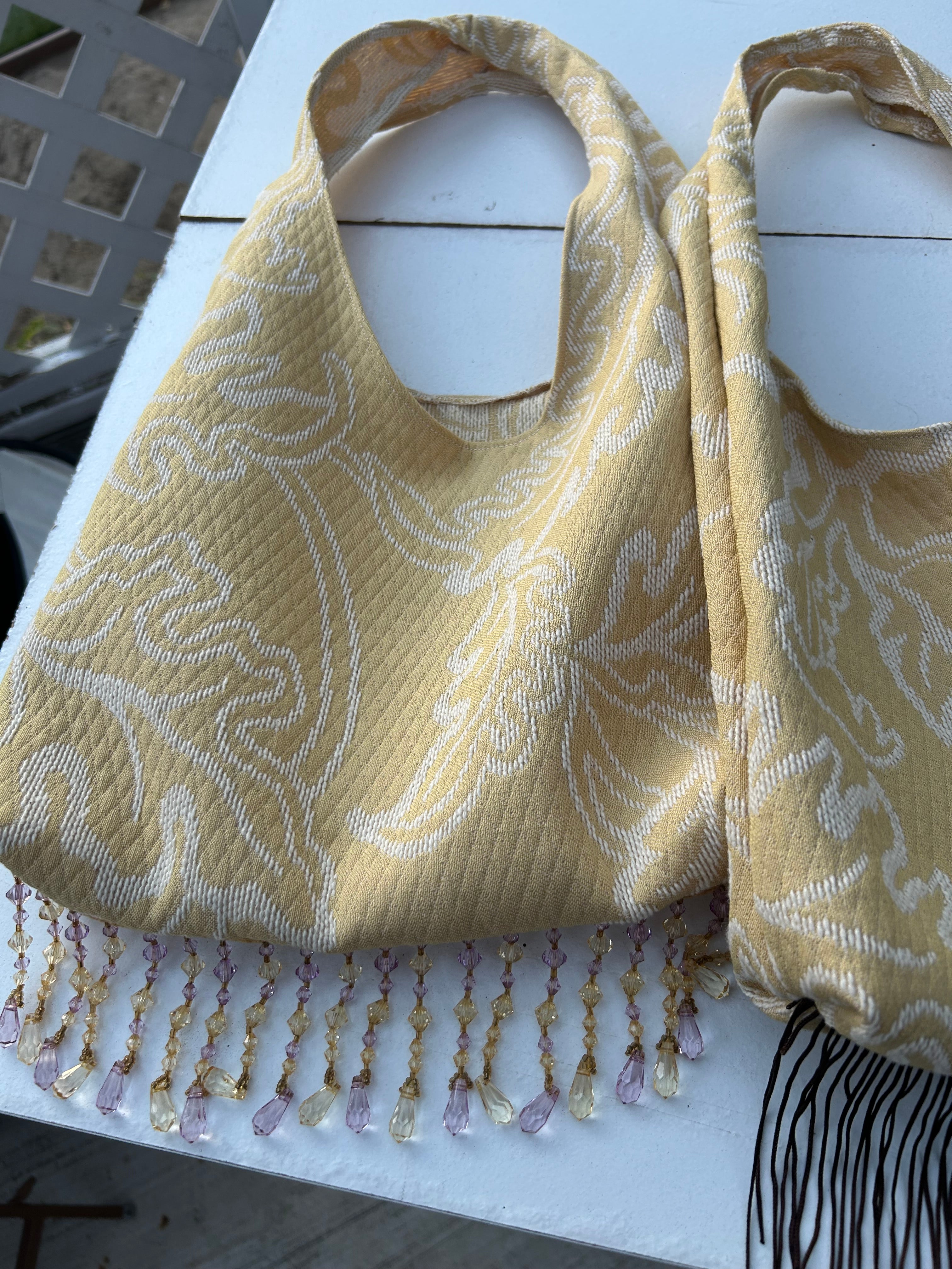Yellow Tassel purse with purple crystal trim