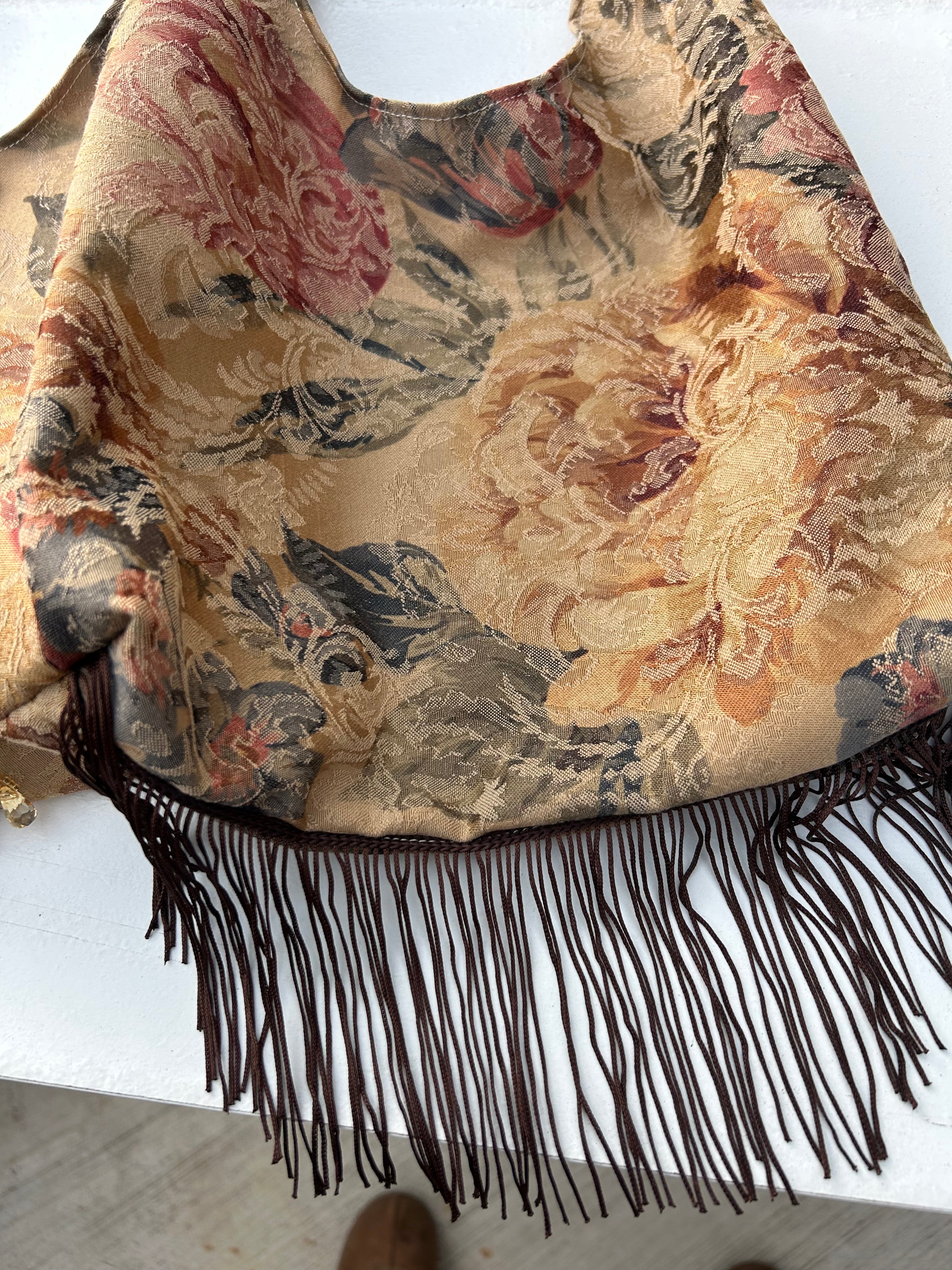 Brown floral tassel purse with brown fringe trim