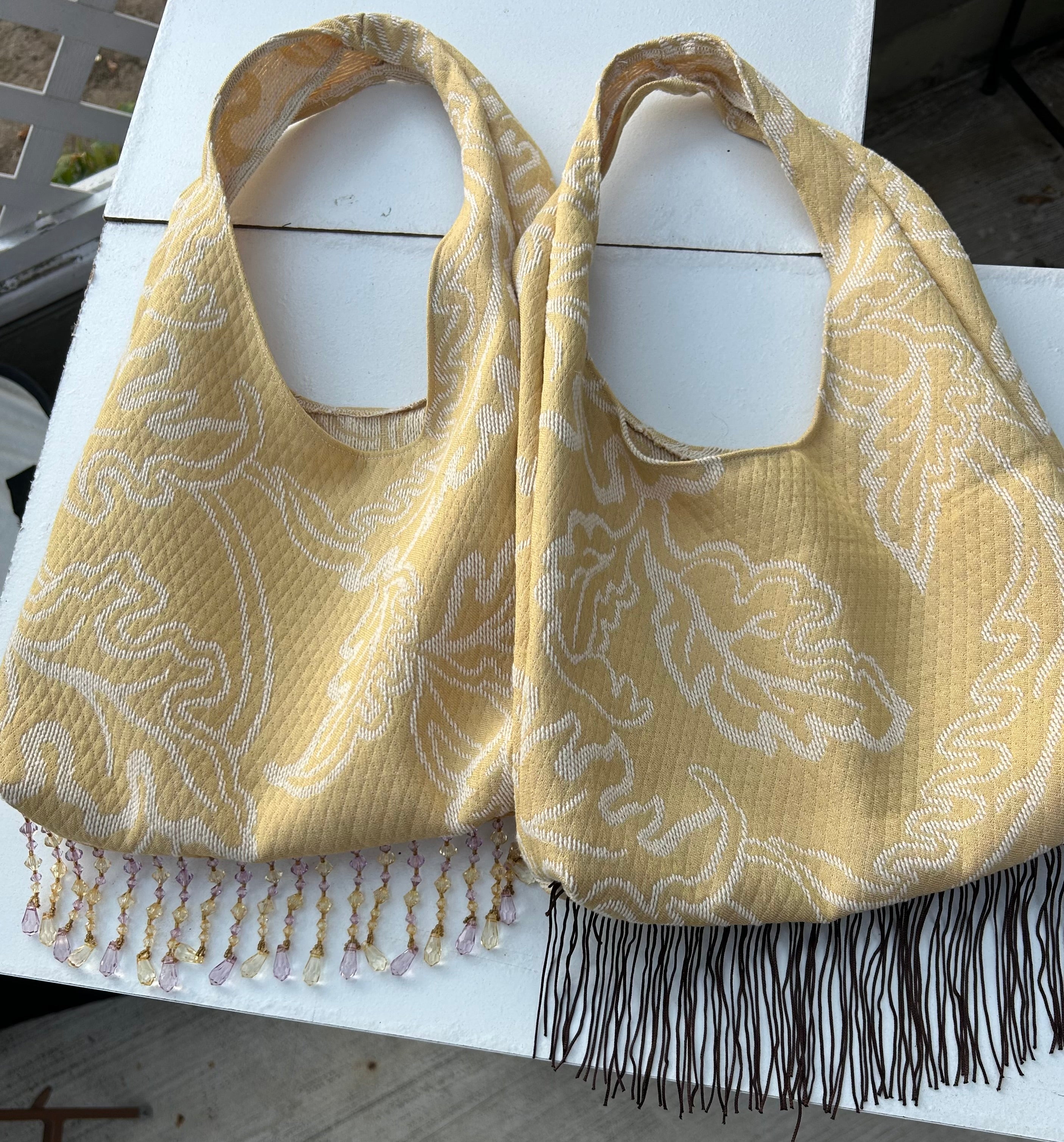 Yellow Tassel purse with purple crystal trim