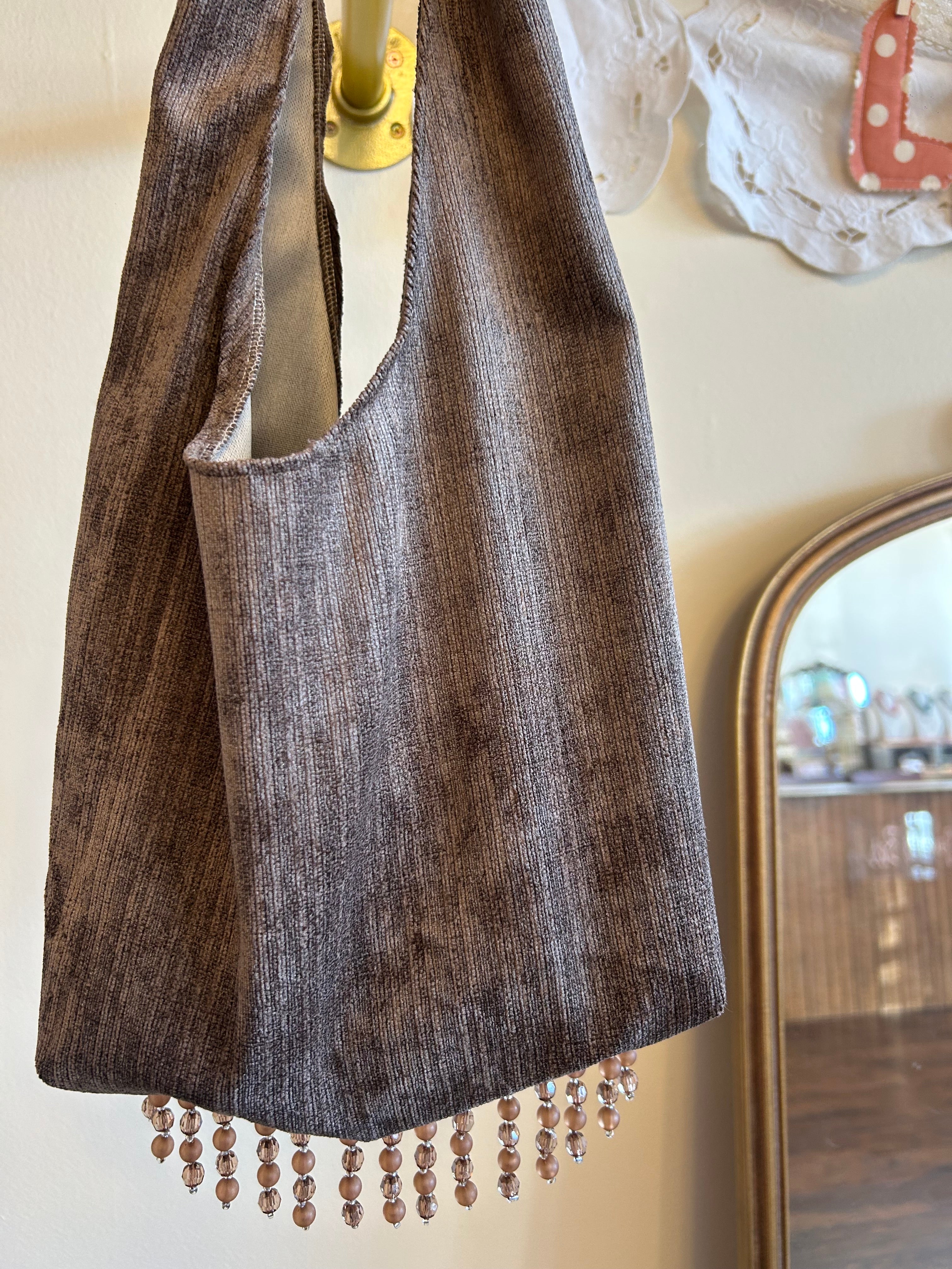 Brown faux suede purse with crystal trim